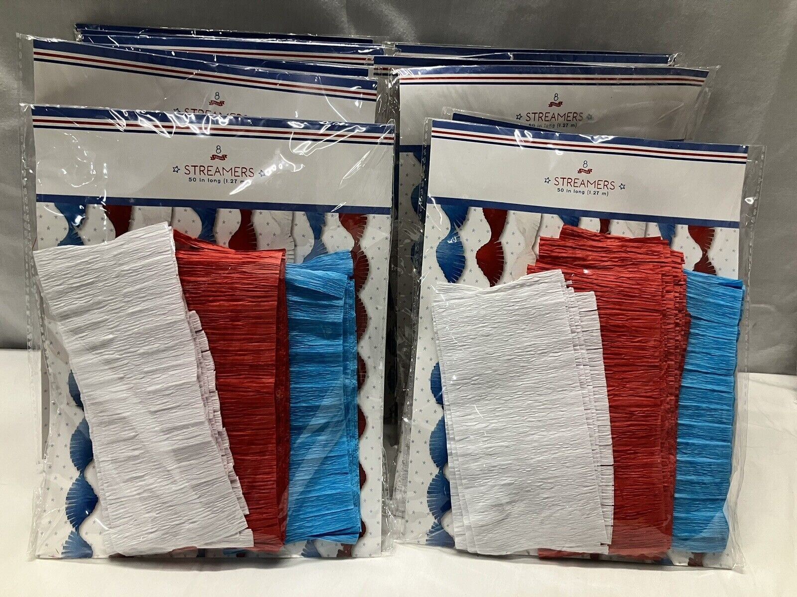 12X Bullseye Playground Red White & Blue Streamers 50” 8ct - Image 1