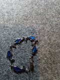 Dolphin Design Bracelet with Blue Accents - Image 1