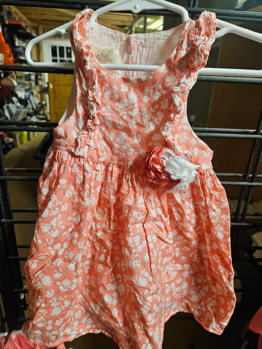 Floral Sleeveless Baby Dress with Ruffle Details - Image 1