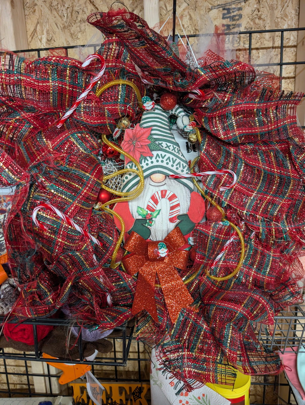Festive Christmas Wreath with Glitter Bow and Candy Cane Accents - Image 1