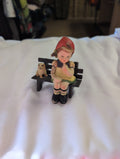Vintage plastic Figurine Girl on Bench with Dog - Image 1