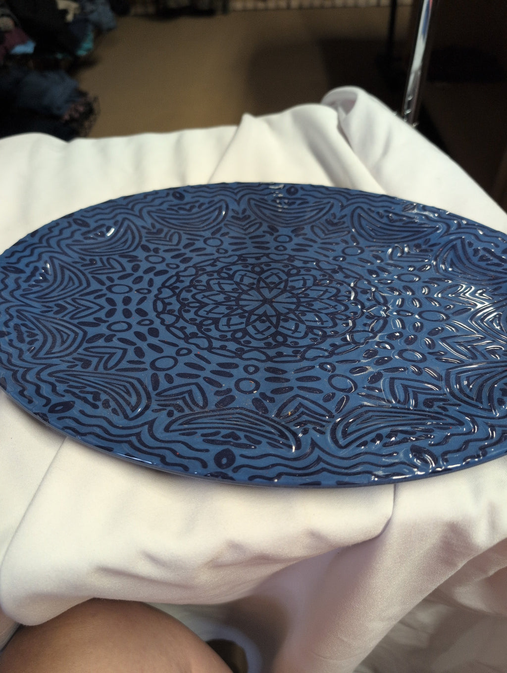 Decorative Blue Ceramic Plate with Intricate Pattern - Image 1