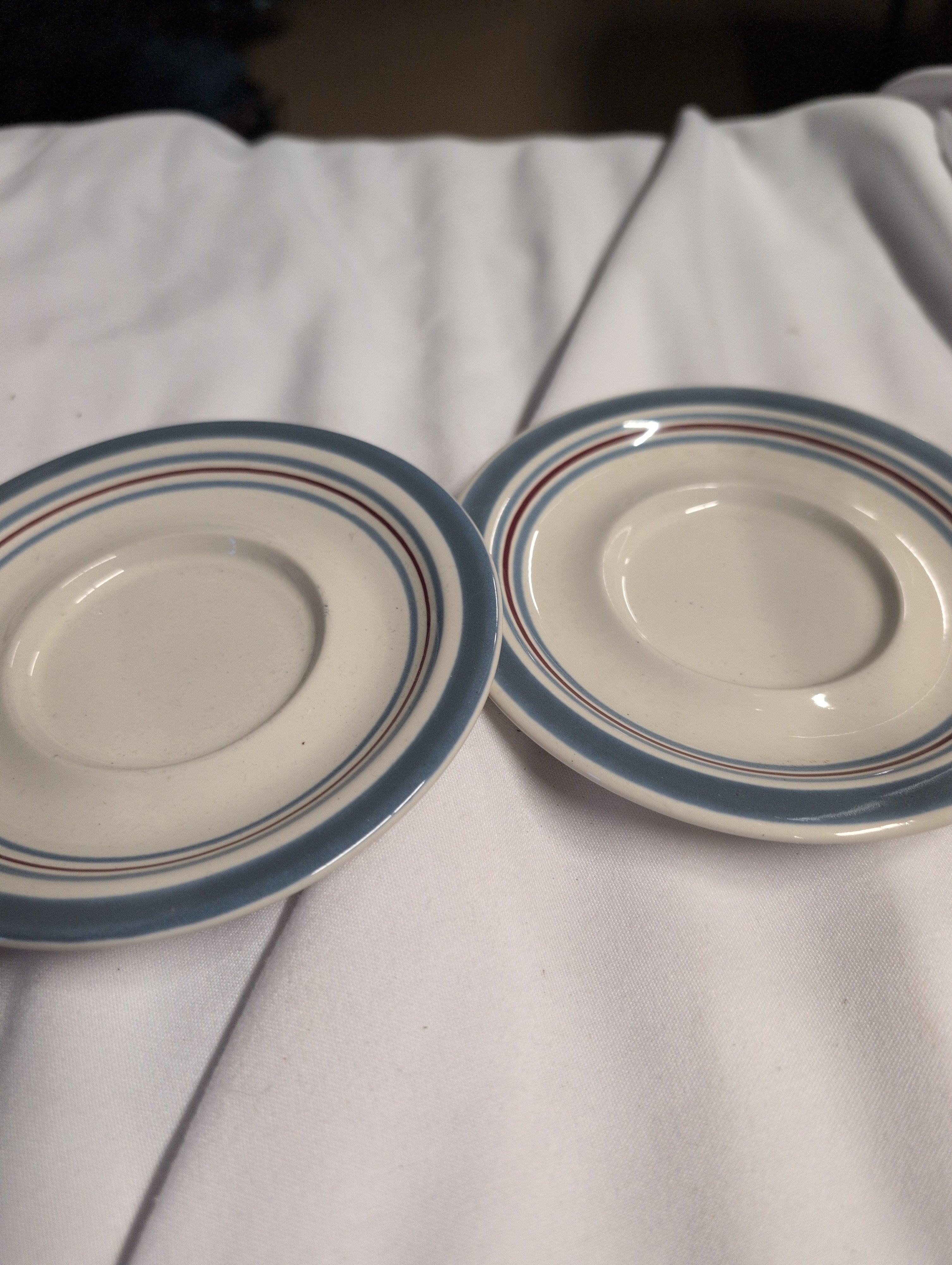 Set of 2 Ceramic Saucer Plates with Blue Trim - Image 1