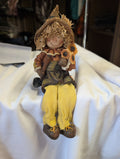 Decorative Scarecrow Figurine with Sunflowers - Image 1