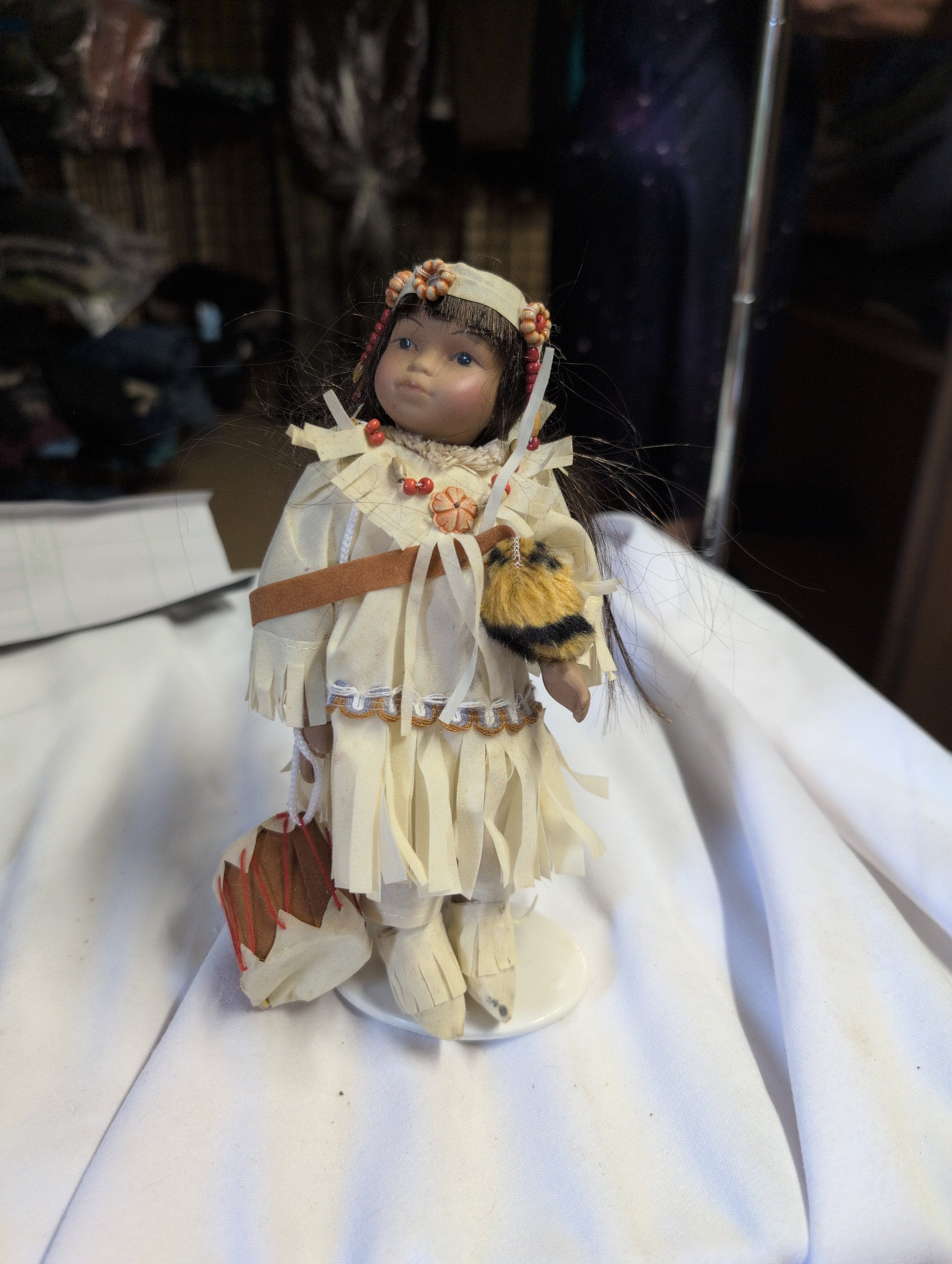 Native American Style Porcelain Doll with Drum - Image 1